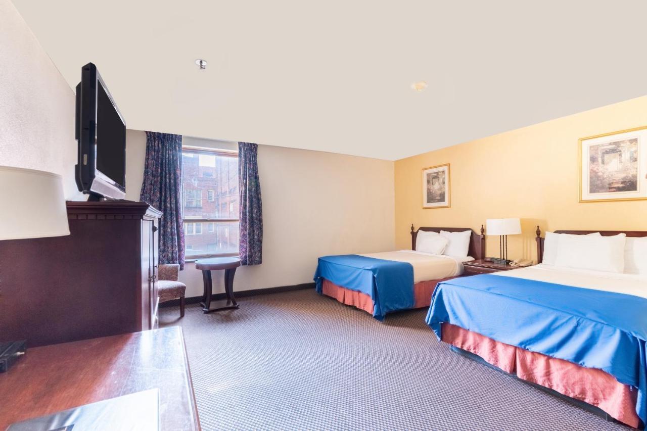 Mclure Hotel Уилинг Экстерьер фото